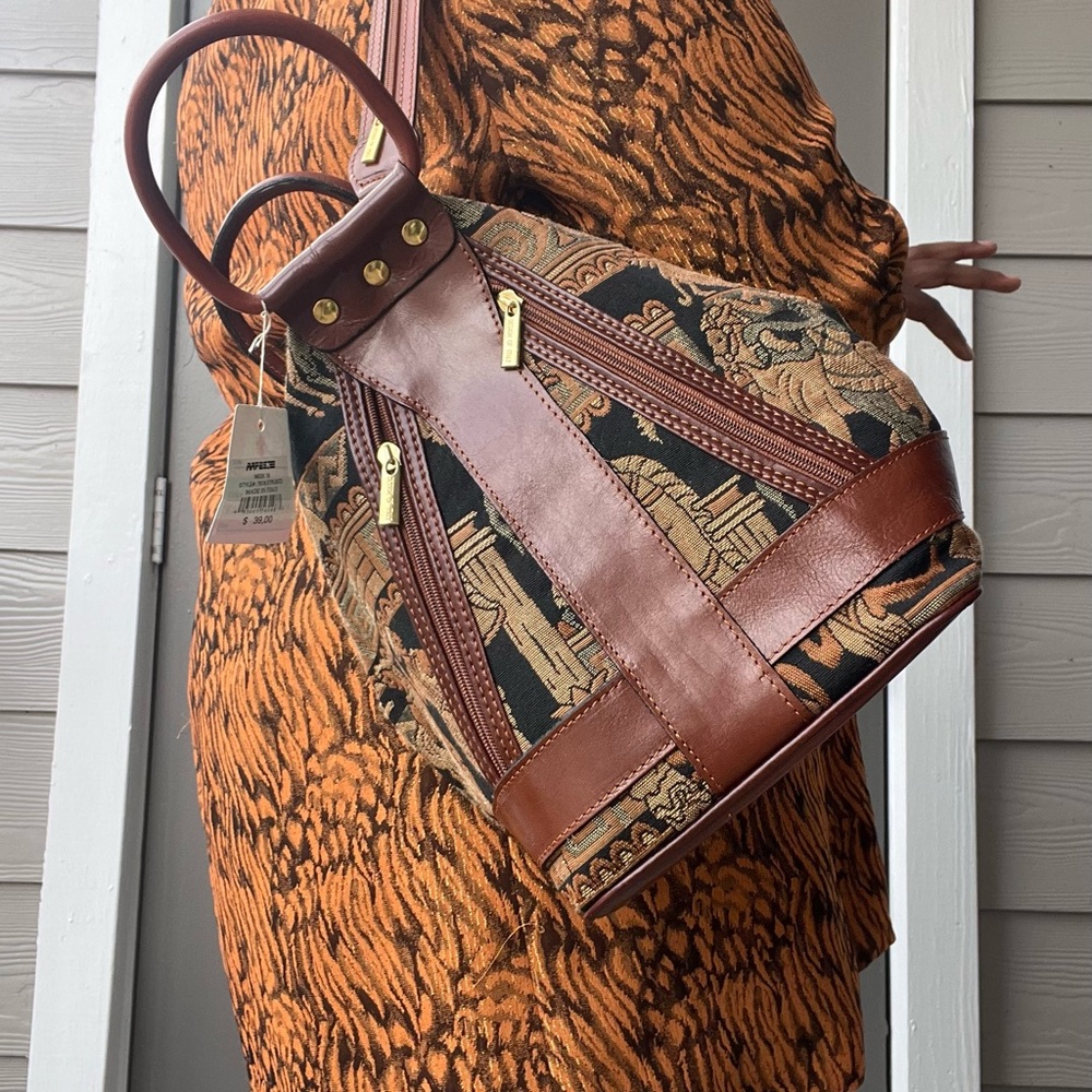 Vintage Egyptian sling bag 
Such a cool bag!
